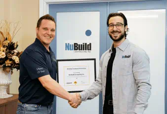 Employees of NuBuild Contracting Inc. being presented with the Enbridge Award of Excellence for Excavating. 
