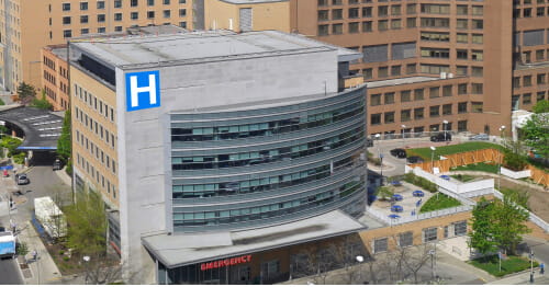 Urban area with large hospital in foreground.