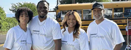 Enbridge Gas employees in front of a school bus