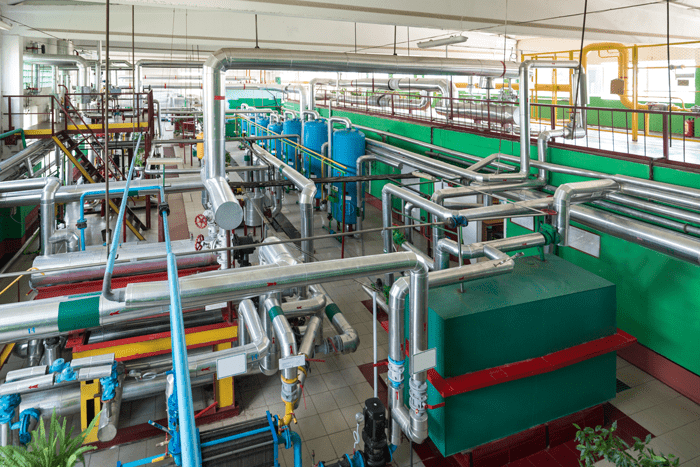 Overhead view of industrial boiler room.