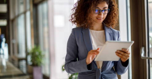 Businesswoman looking at tablet